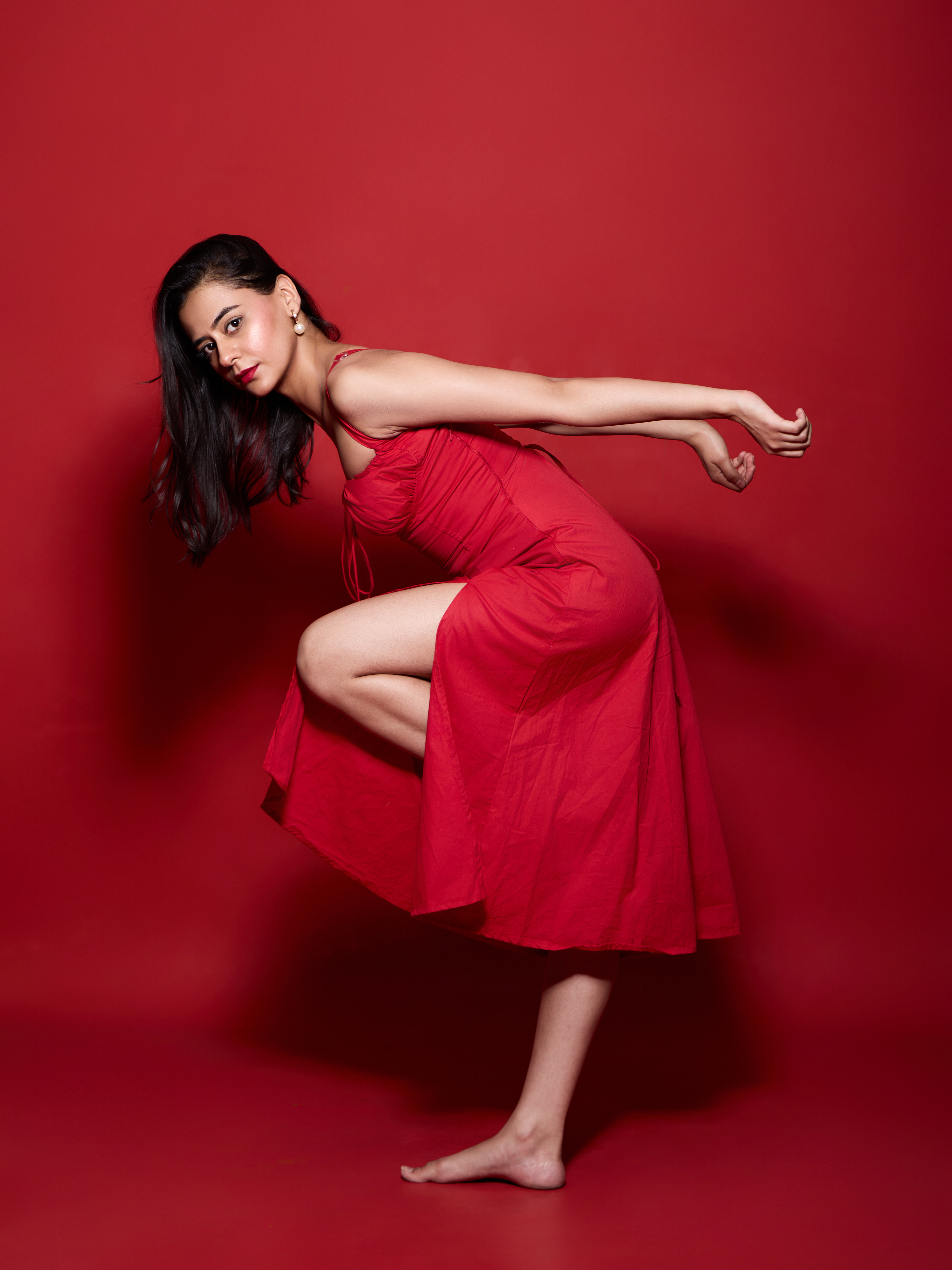 Red Background Portrait with Butterfly Lighting